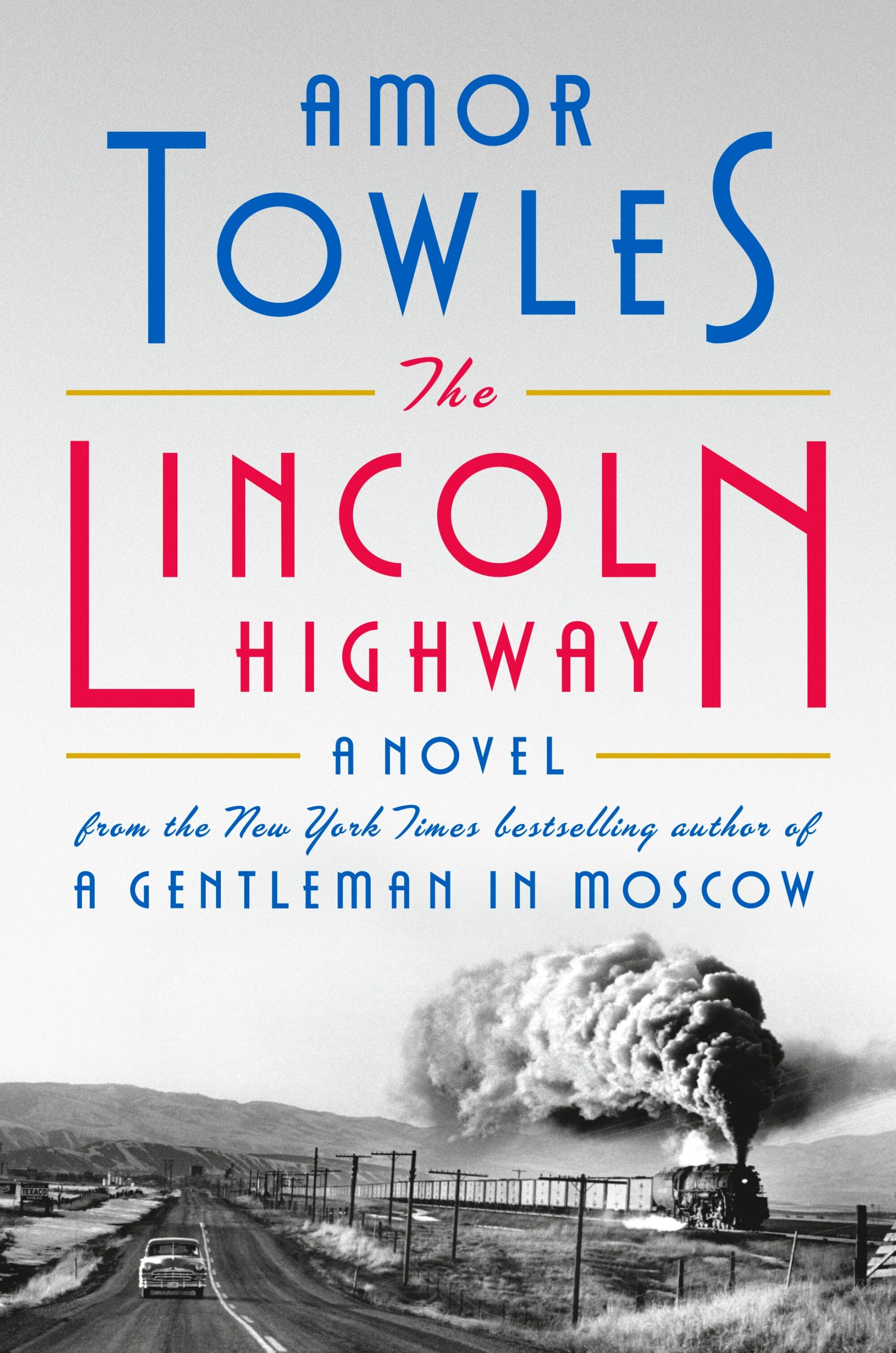 A black-and-white photograph of a vintage train and car on the cover for Amor Towles' "The Lincoln Highway."