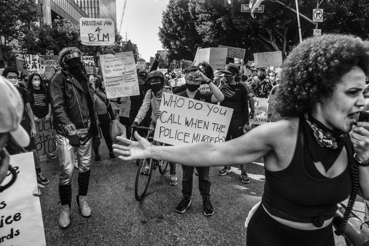 "Untitled," 2020, by Adrian White, shows protesters at a Black Lives Matter rally.