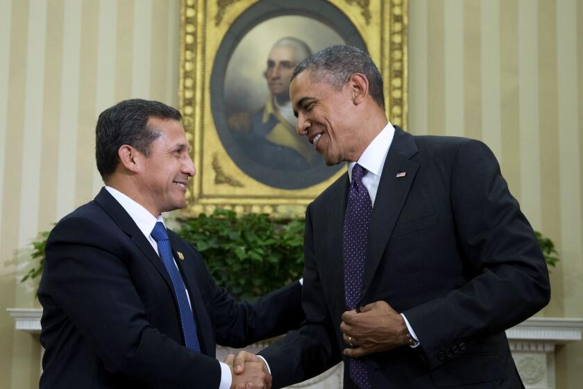 President Obama shakes hands with Peru's President Ollanta Humala at the White House after discussing the Trans-Pacific Partnership Agreement.