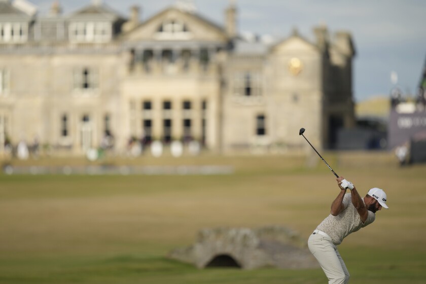 Dustin Johnson of the USA plays the 18th hole on the Old Course in the first round of the British Open.