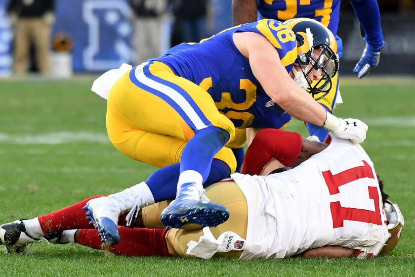Rams safety Cody Davis is called for a penalty while hitting 49ers receiver Jeremy Kerley during the fourth quarter.