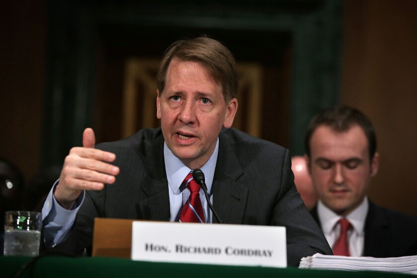 Richard Cordray, director of the Consumer Financial Protection Bureau, testifies last monght before the Senate Banking, Housing and Urban Affairs Committee on his agency's semiannual report to Congress.