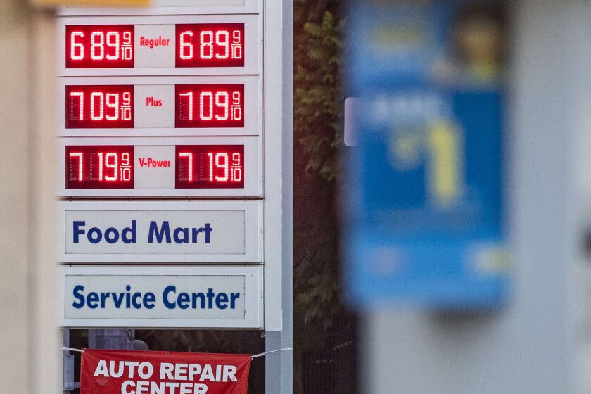 San Diego, CA - September 27: A person stands near the pumps at Shell Gas Station on Tuesday, Sept. 27, 2022 in San Diego, CA. The average price for a gallon of regular in the area increased nearly 12 cents Tuesday, reaching $5.90. That's 48.5 cents a gallon higher than one week ago and 65 cents higher than one month ago. (Meg McLaughlin / The San Diego Union-Tribune)