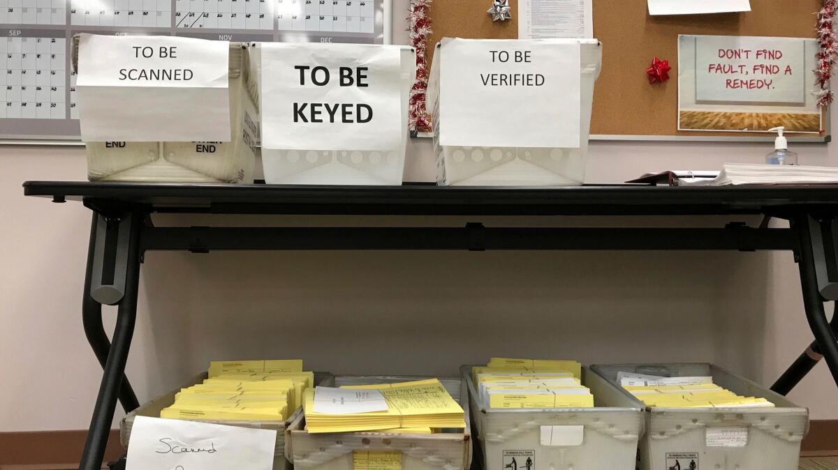 Ballots await further processing at the Franklin County Board of Elections in Columbus, Ohio on Dec. 14, 2017.