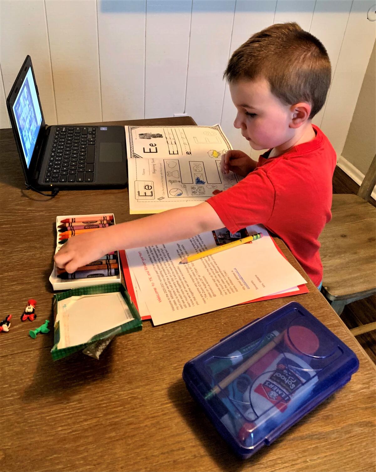 A Cloud Campus student follows along with a school assignment while working from home during the 2021-22 school year.