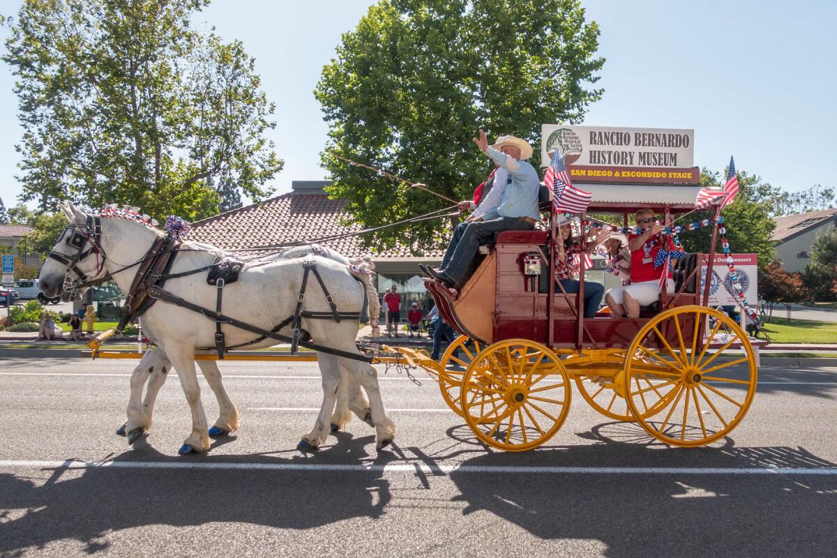 The Rancho Bernardo Historical Society entered its horse-drawn mud wagon in the 2019 Spirit of the Fourth Parade.