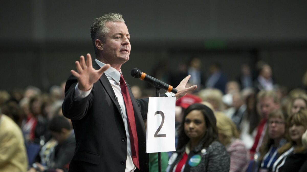 Travis Allen, candidate for chair of the California Republican Party, speaks to delegates after his nomination during the party convention.