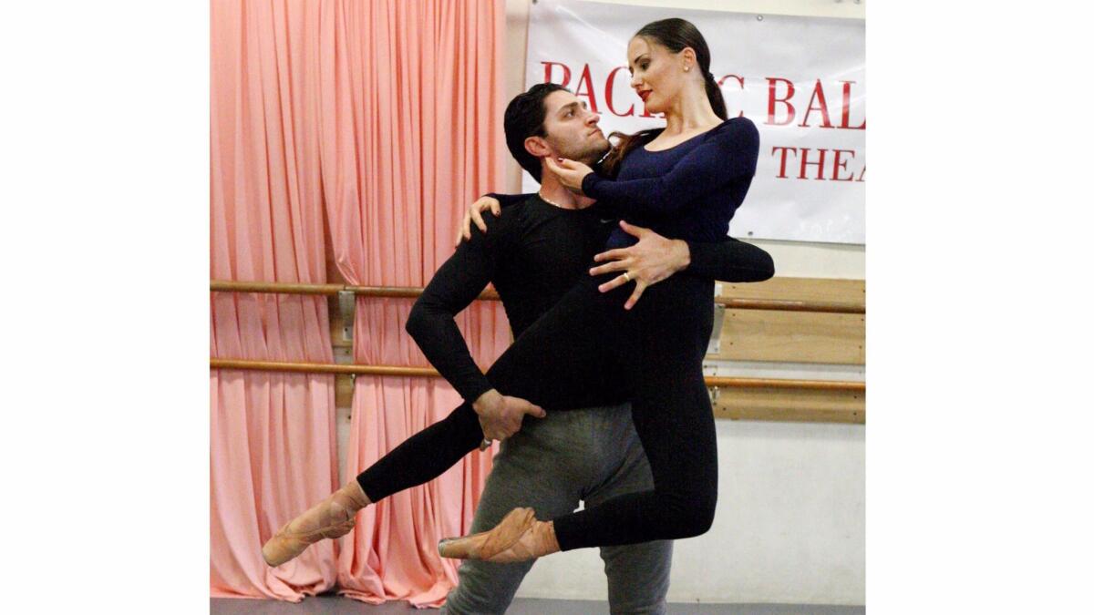 Husband and wife Eduard Sargsyan and Inga Demetryan rehearse in Burbank Monday. The dance company will perform several pieces to the music of composer Aram Khachaturian at the Alex Theatre in Glendale on on Sept. 17. The show is called, "The Best of Khachaturian."