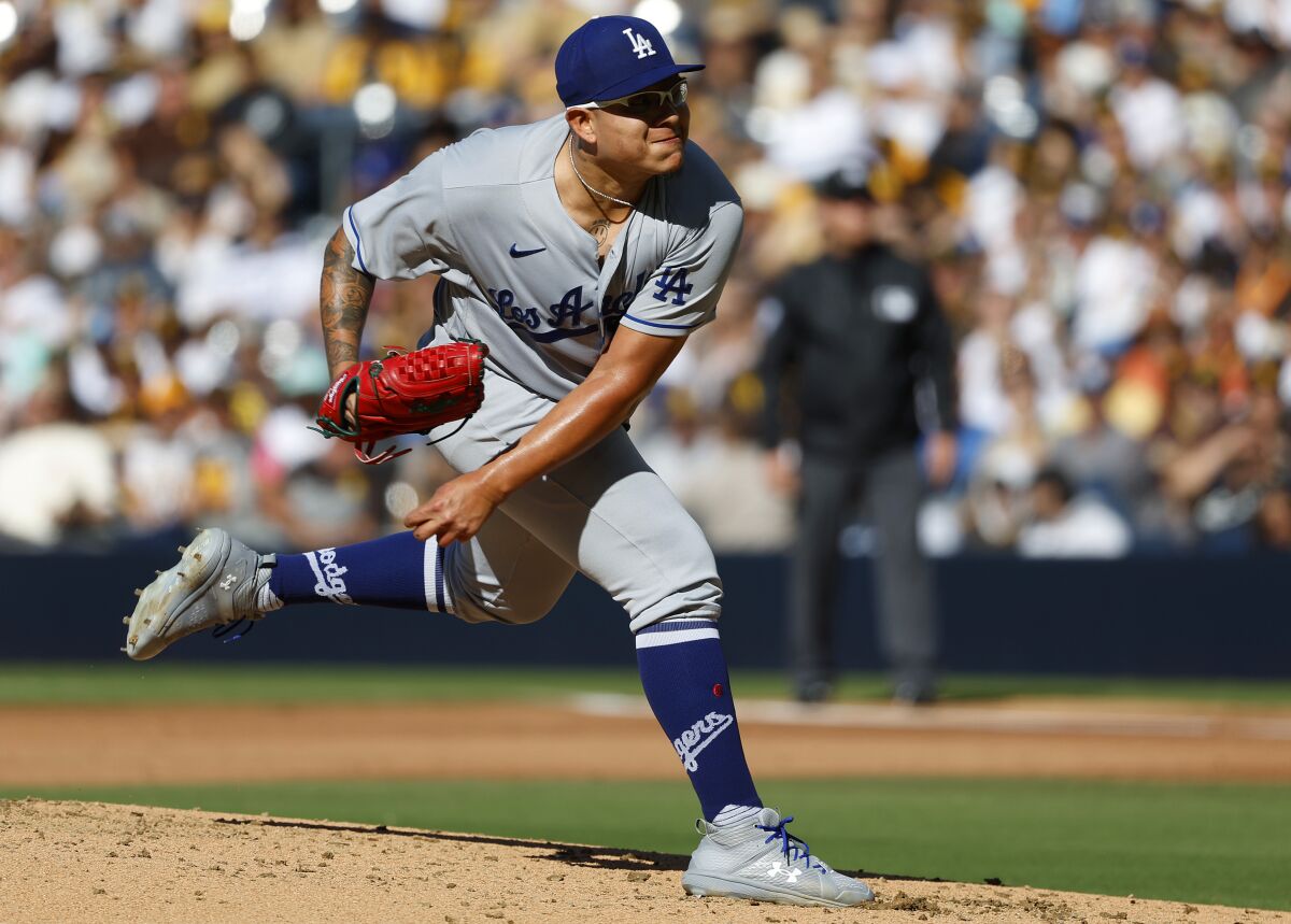 Dodgers pitcher Julio Urías throws against the San Diego Padres on Sunday.