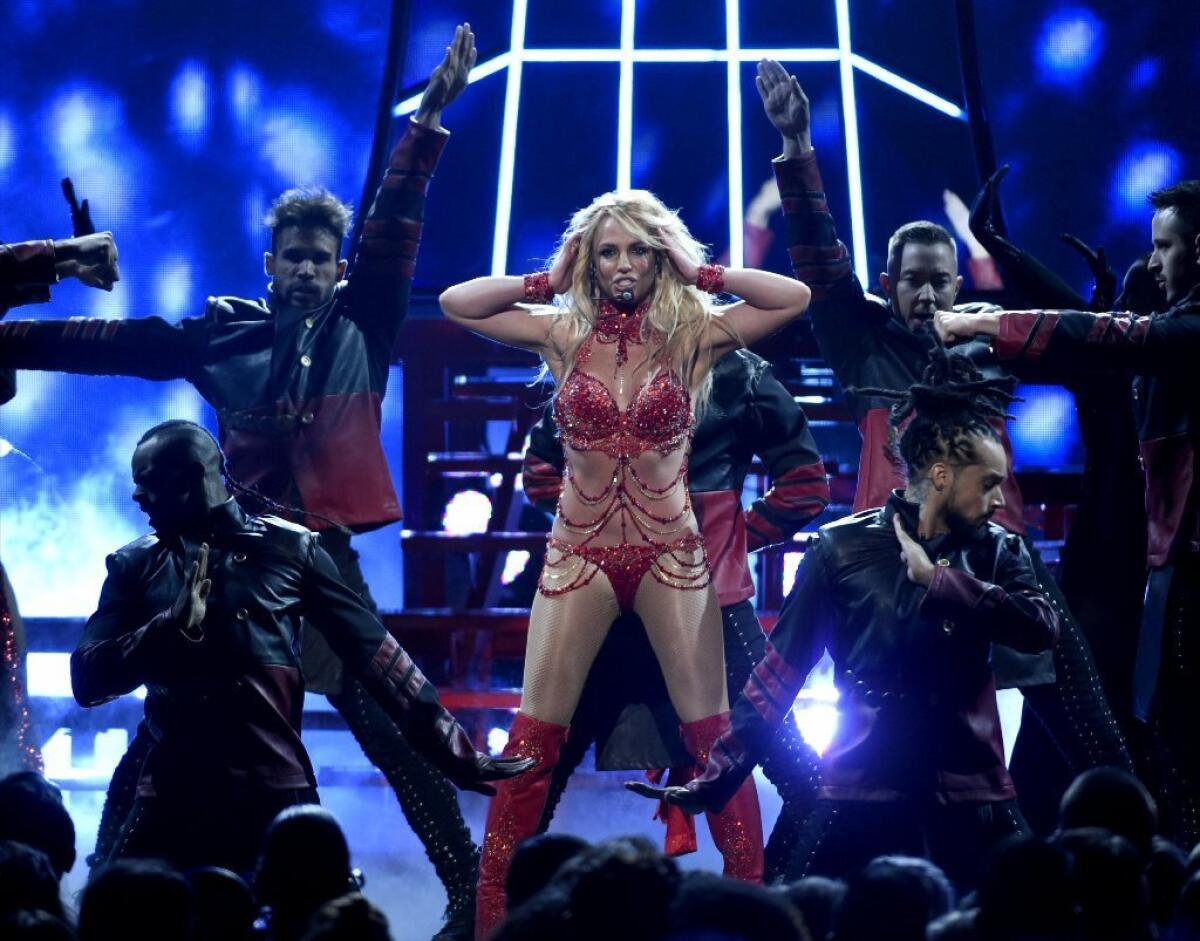 Britney Spears performs at the 2016 Billboard Music Awards in wardrobe pieces created by L.A. couture designer Mark Zunino.