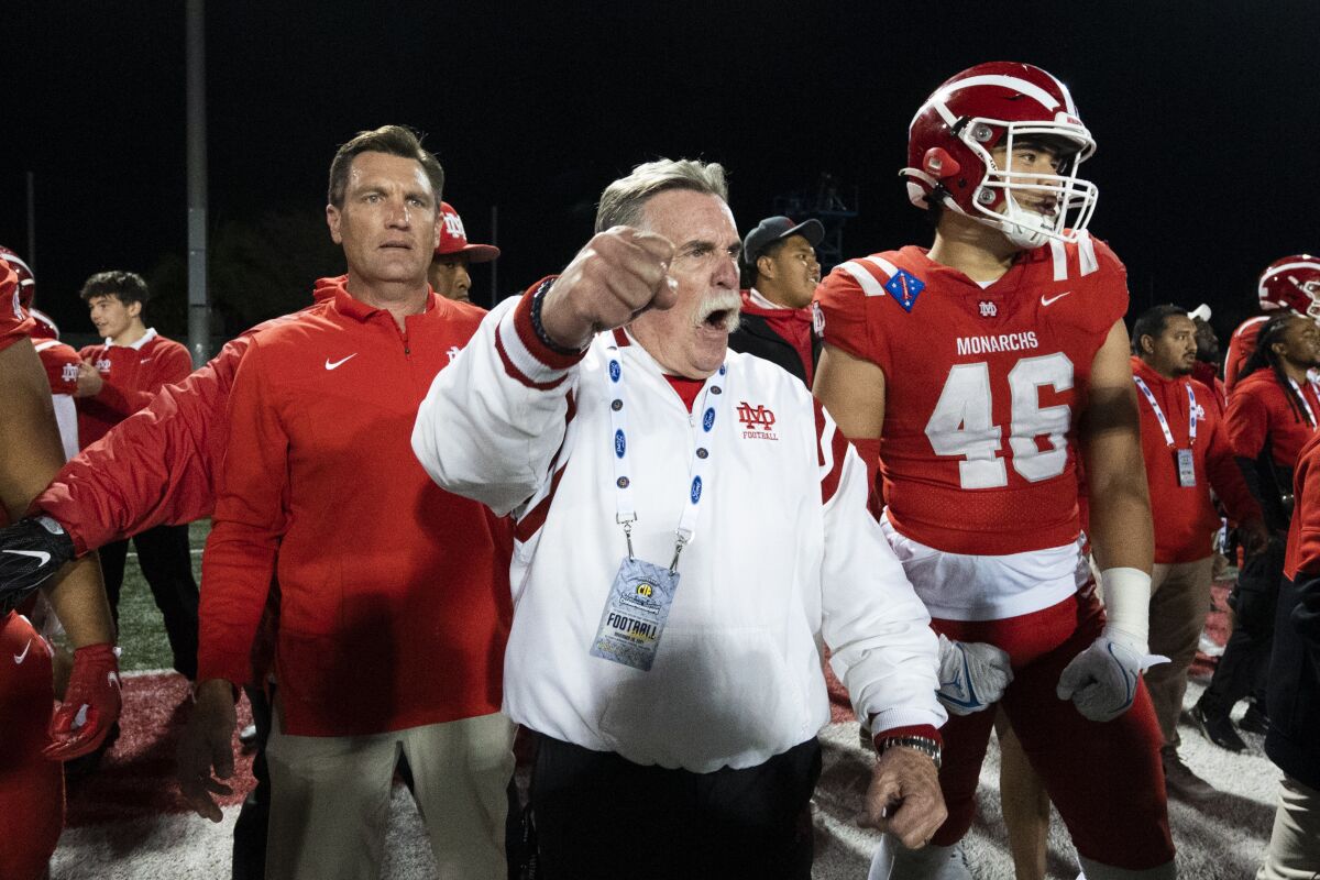 Mater Dei coach Bruce Rollinson reacts after defeating Servite for the CIF Southern Section Division 1 title.