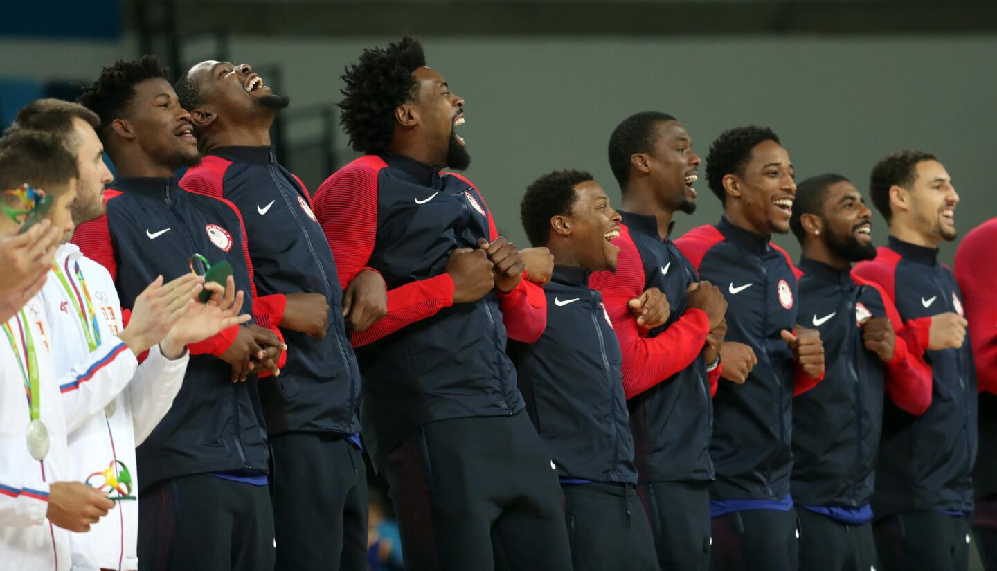 Jimmy Butler and Team USA celebrate their gold medal win over Serbia in basketball on Aug. 21, 2016, at Carioca Arena 1 in Rio de Janeiro.