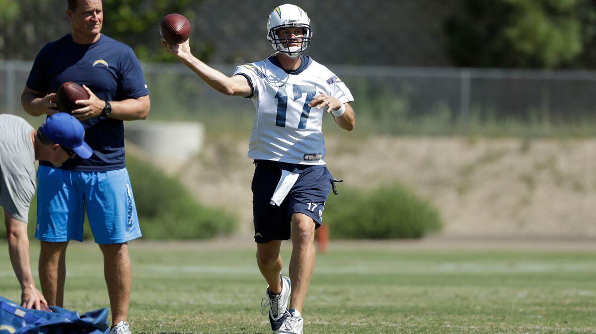 Chargers quarterback Philip Rivers trains during practice, Tuesday.