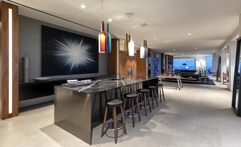 Spanning a full story of the Beverly West boutique high-rise, the condo includes four bedrooms and seven bathrooms.