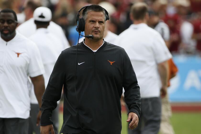 Texas Longhorns defensive coordinator Todd Orlando walks on the sideline during the first half.