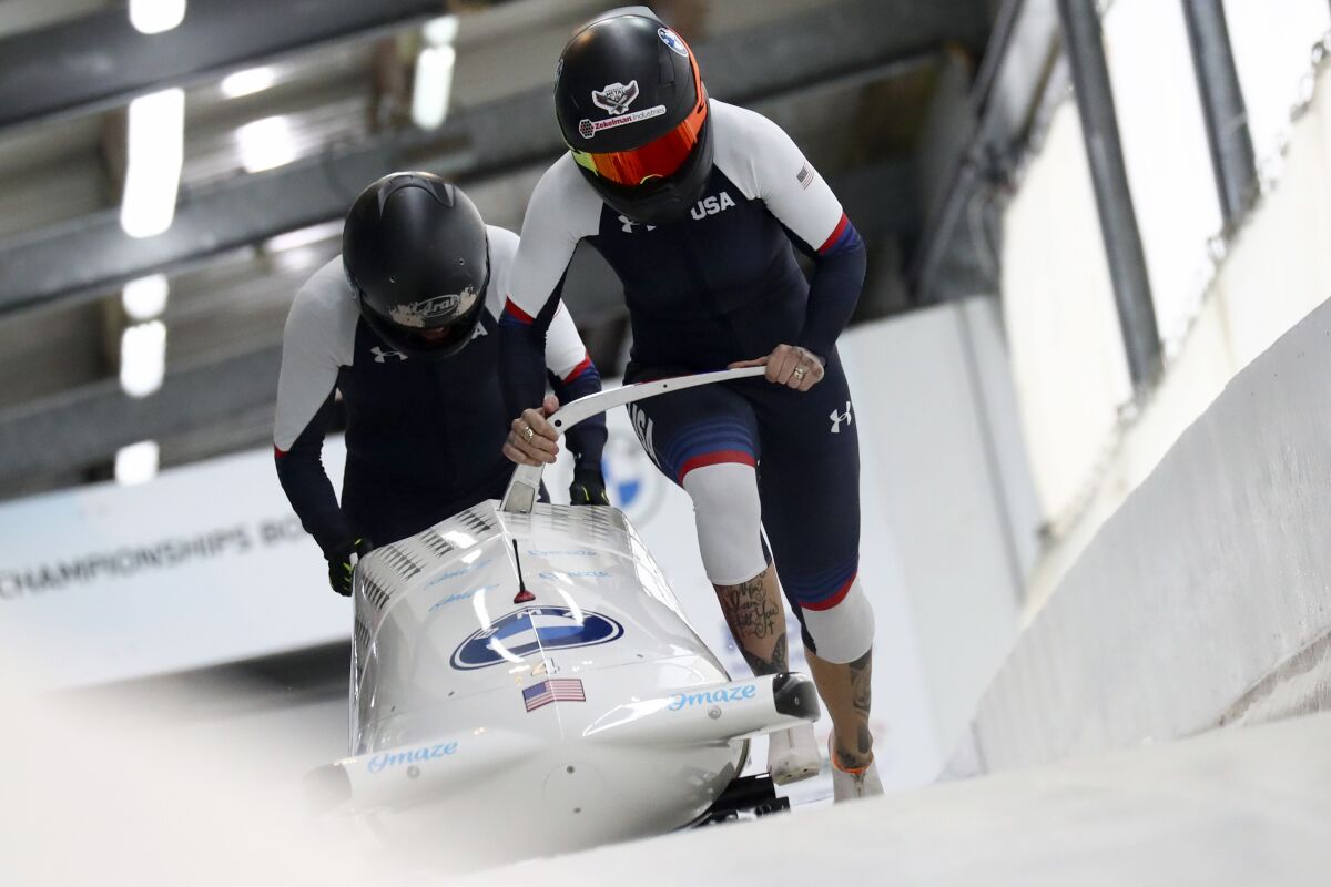 Carlsbad's Kaillie Humphries and Lolo Jones compete in two-woman bobsled championship on Feb. 5 in Germany