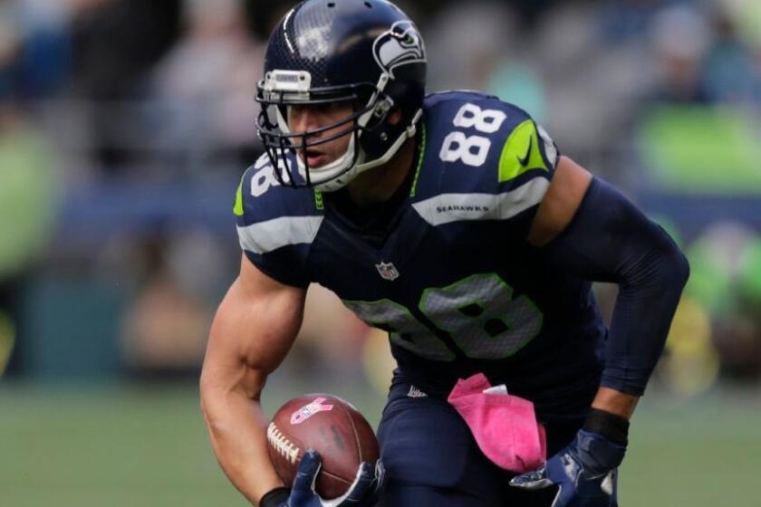 Seahawks tight end Jimmy Graham runs with the ball after making a catch against the Falcons during a game on Oct. 16.