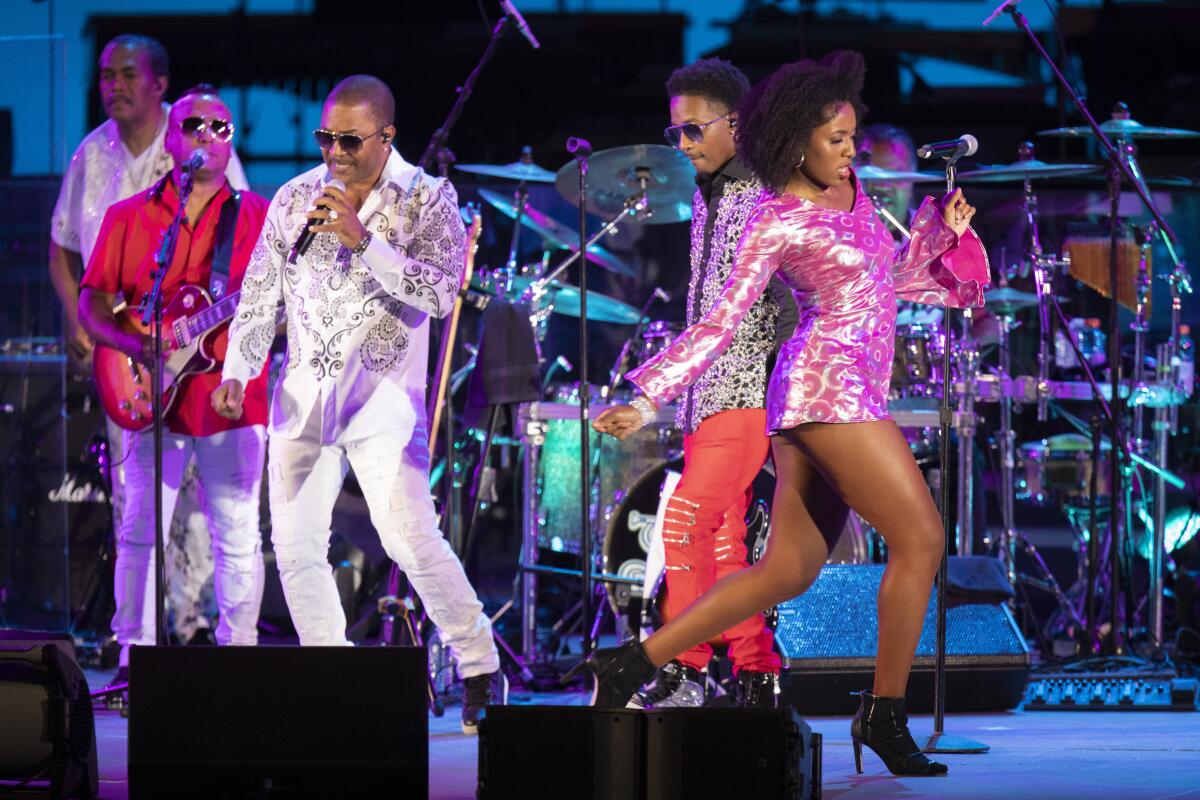 An R&B band performs in concert