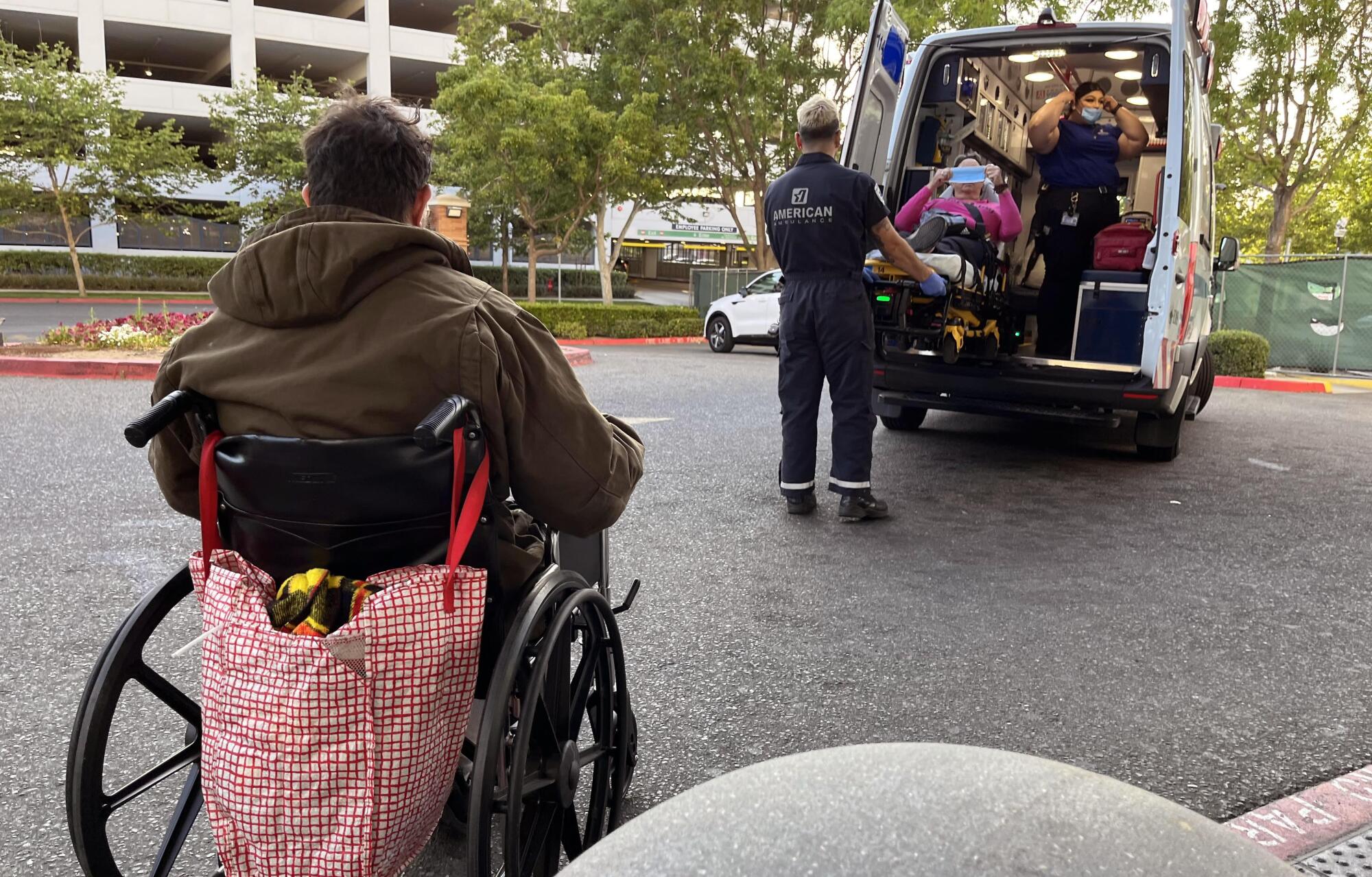 A patient arrives by ambulance at the Community Regional Medical Center in Fresno.