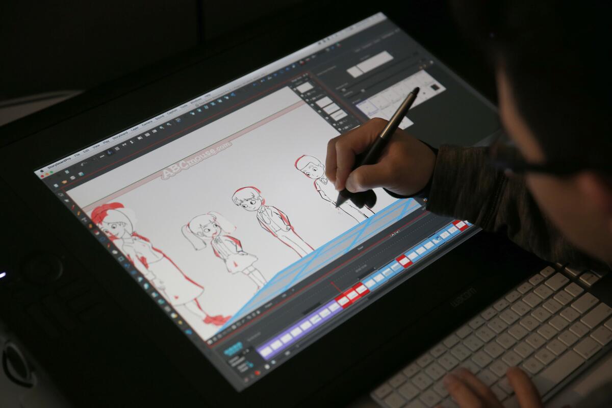 Storyboard artist Jay Chen animates a video for the English-language learning version of ABCmouse. (Allen J. Schaben / Los Angeles Times)