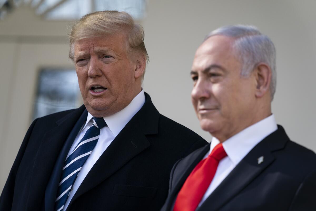 President Trump and Israeli Prime Minister Benjamin Netanyahu field media questions at the White House on Jan. 27. Netanyahu was visiting ahead of Trump's peace plan announcement.