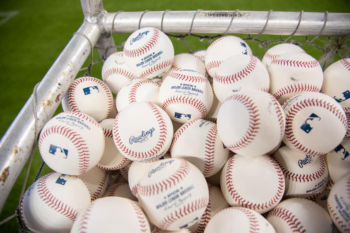 A detailed view of the MLB batting practice baseballs.