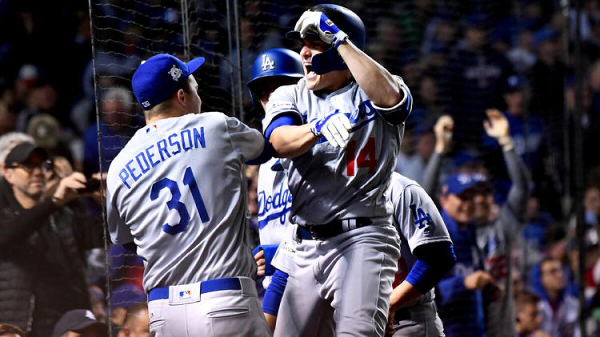 Enrique Hernandez celebrates his grand slam.