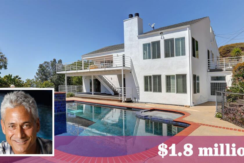 Greg Louganis has sold his ocean-view home in Malibu for $1.8 million.