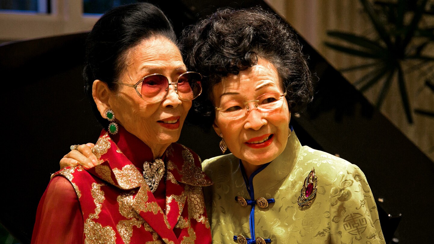 Madame Wu, left, and Reiko Moe pose for a picture at Wu's 100th birthday celebration Oct. 25 at the Peninsula Beverly Hills hotel. By American calculations, Wu turned 99 on Oct. 24, but in her native China babies were considered to be 1 year old at birth.