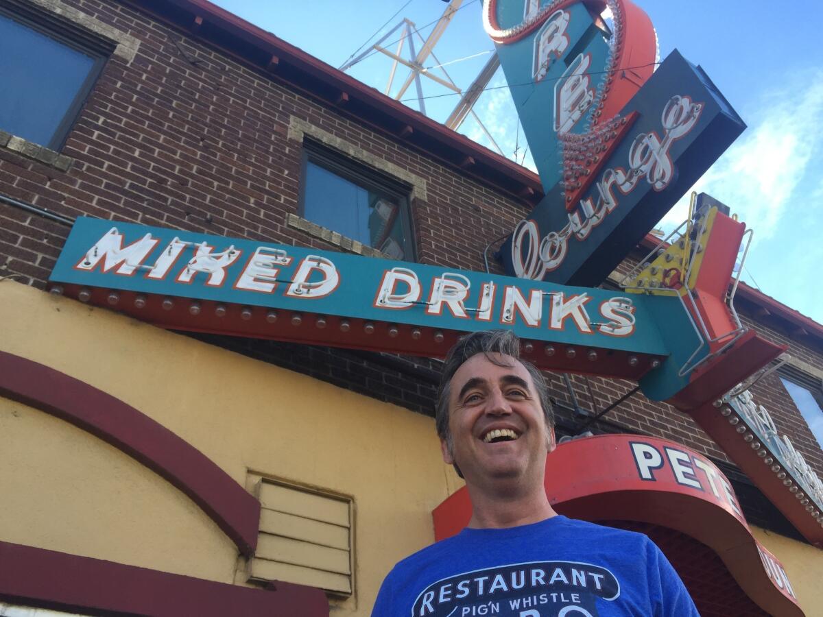 Jonny Barber on his beloved Colfax Avenue in Denver.