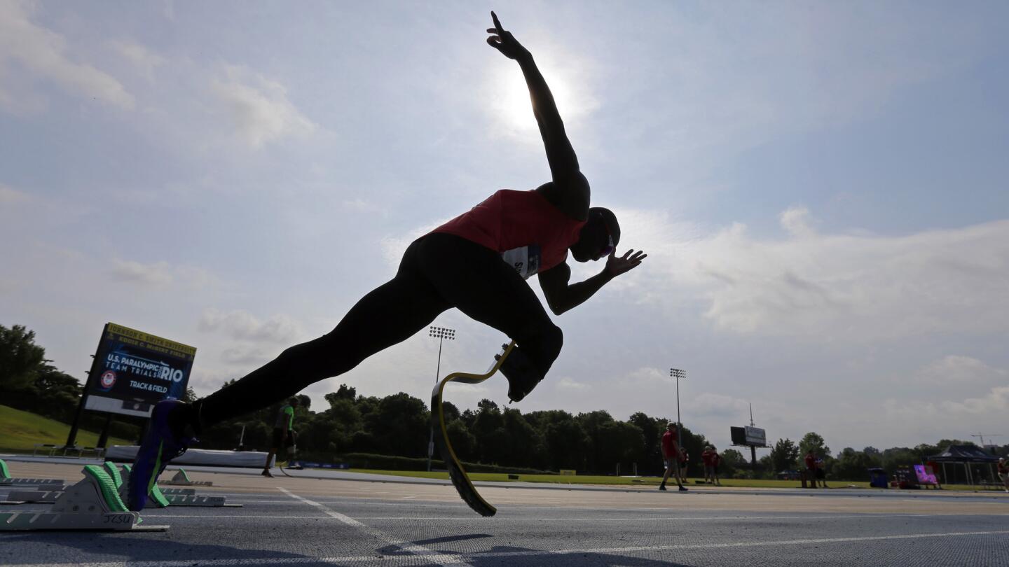 Kionte Storey practices his starts before his heat in the men's 100-meter dash.