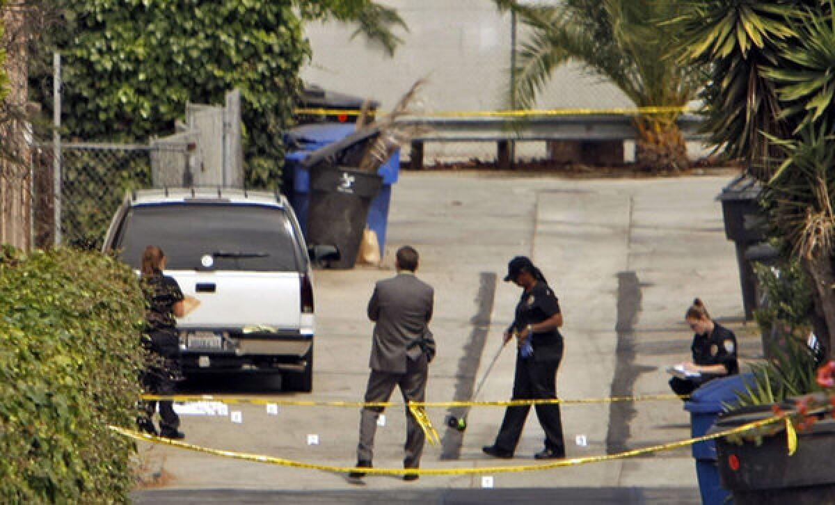 Police investigate a double shooting Tuesday morning in the 1500 block of Michigan Avenue in Santa Monica.