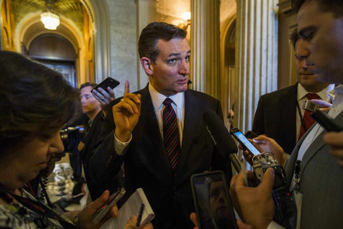 Sen. Ted Cruz (R-Texas) speaks to the media after the Senate voted against his motion on the highway bill in Washington.