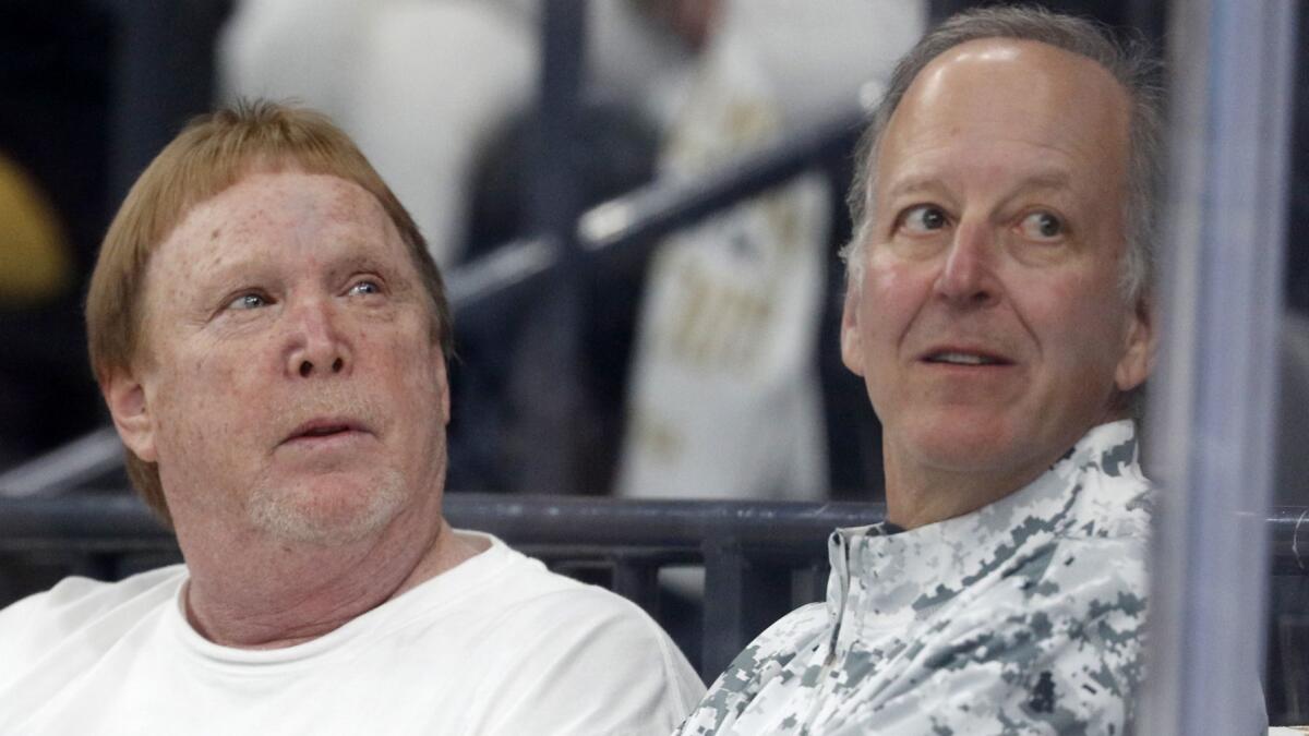 Broadcaster Jim Gray sits with Raiders owner Mark Davis before Game 2 of the 2018 Stanley Cup Final in Las Vegas.