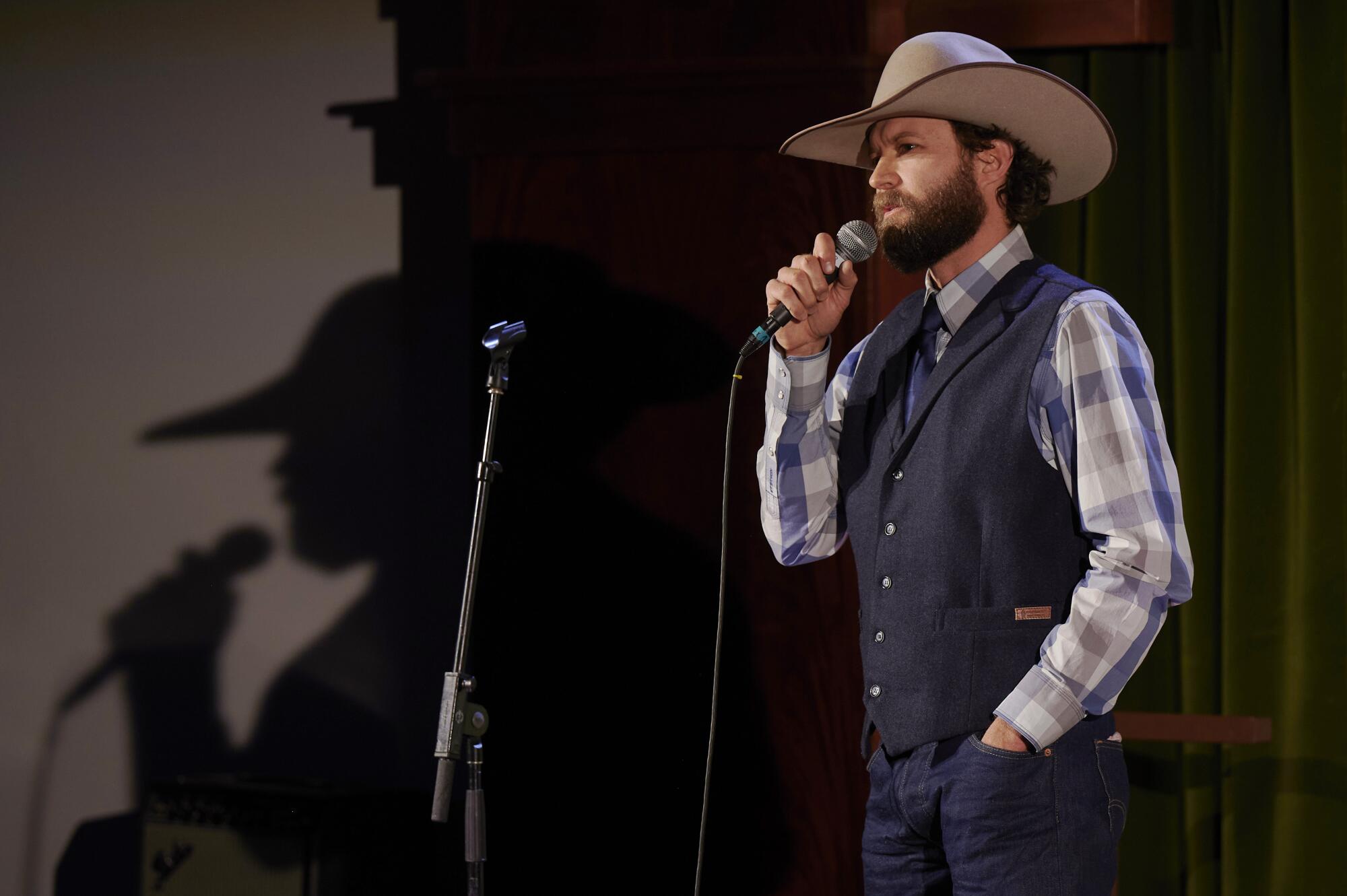 Poet Jake Riley performs at the Western Folklife Center during the National Cowboy Poetry Gathering.