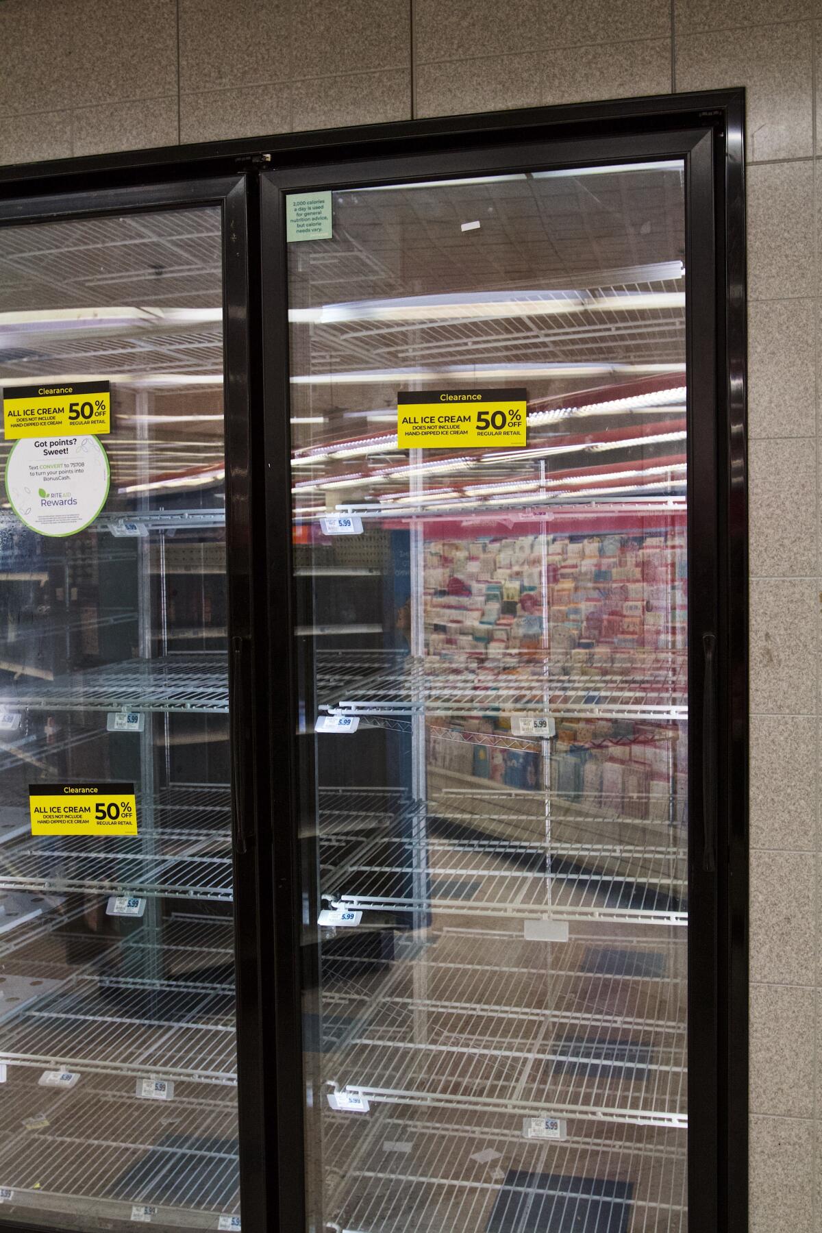 Empty shelves in the freezer aisle of Rite Aid's Alhambra location