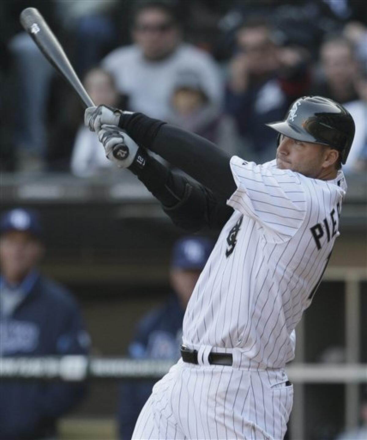 Chicago White Sox pitcher Philip Humber, left, chats with catcher A.J.  Pierzynski during the second inning against the Minnesota Twins in the  first baseball game of a double-header, Monday, Sept. 5, 2011