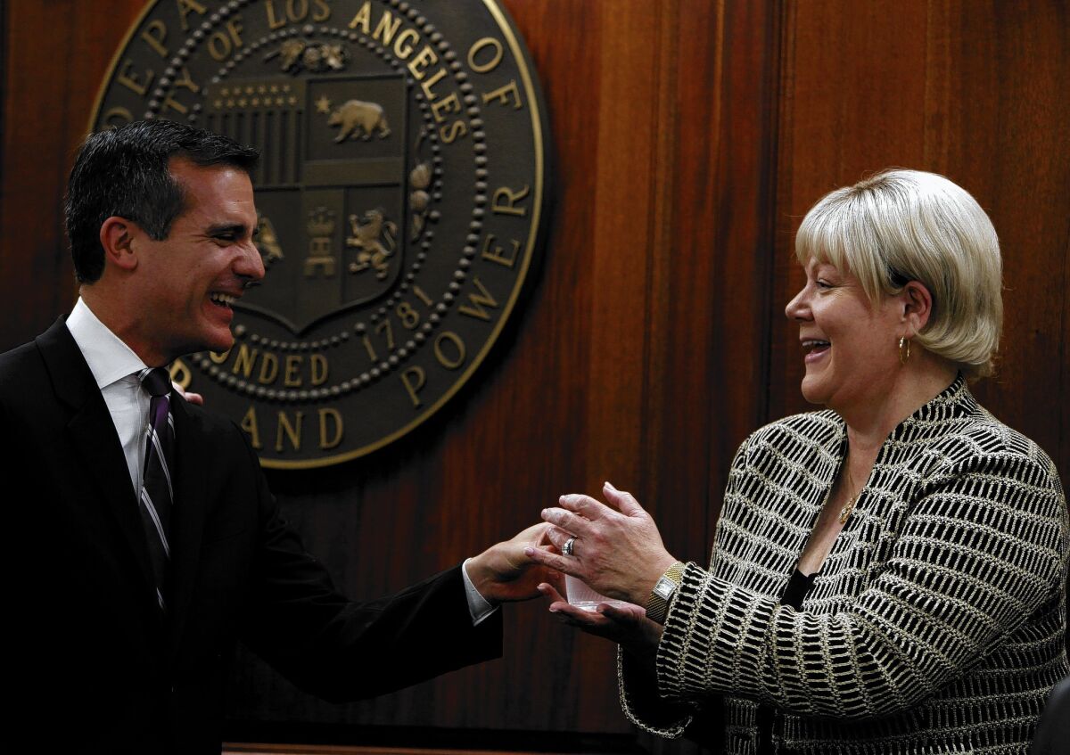 Mayor Eric Garcetti introduces Marcie Edwards, his choice to head the DWP. She began her career at the agency and her father and grandfather worked there.