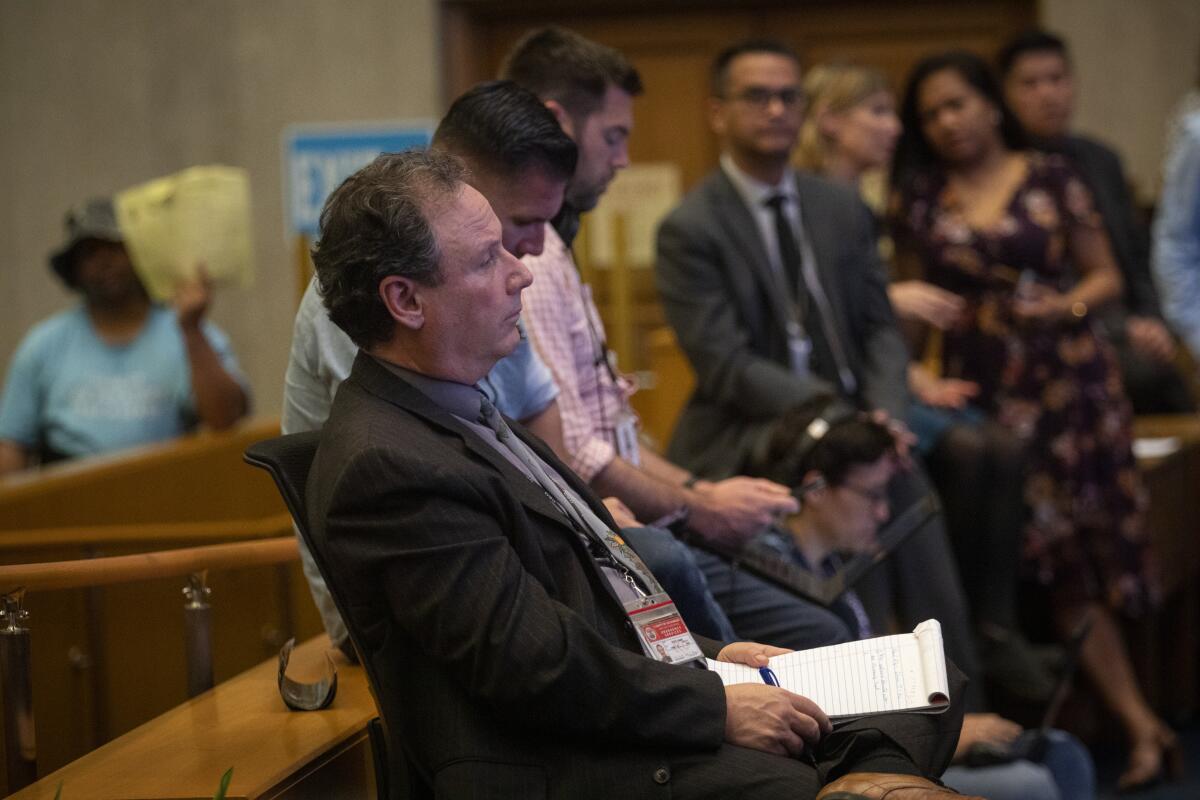  Phil Ansell, L.A. County Homeless Initiative director, speaks before the Los Angeles County Board of Supervisors.