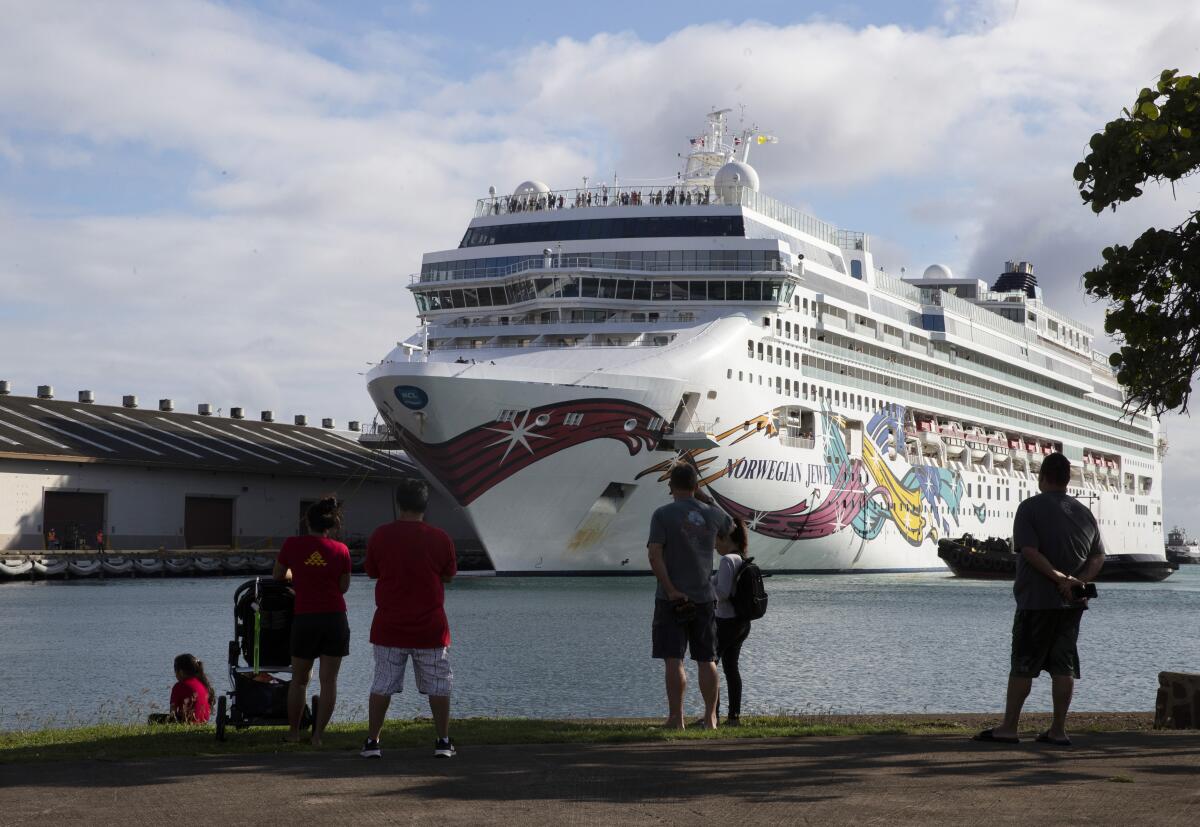 The Norwegian Jewel cruise ship docks at Honolulu Harbor on Sunday.