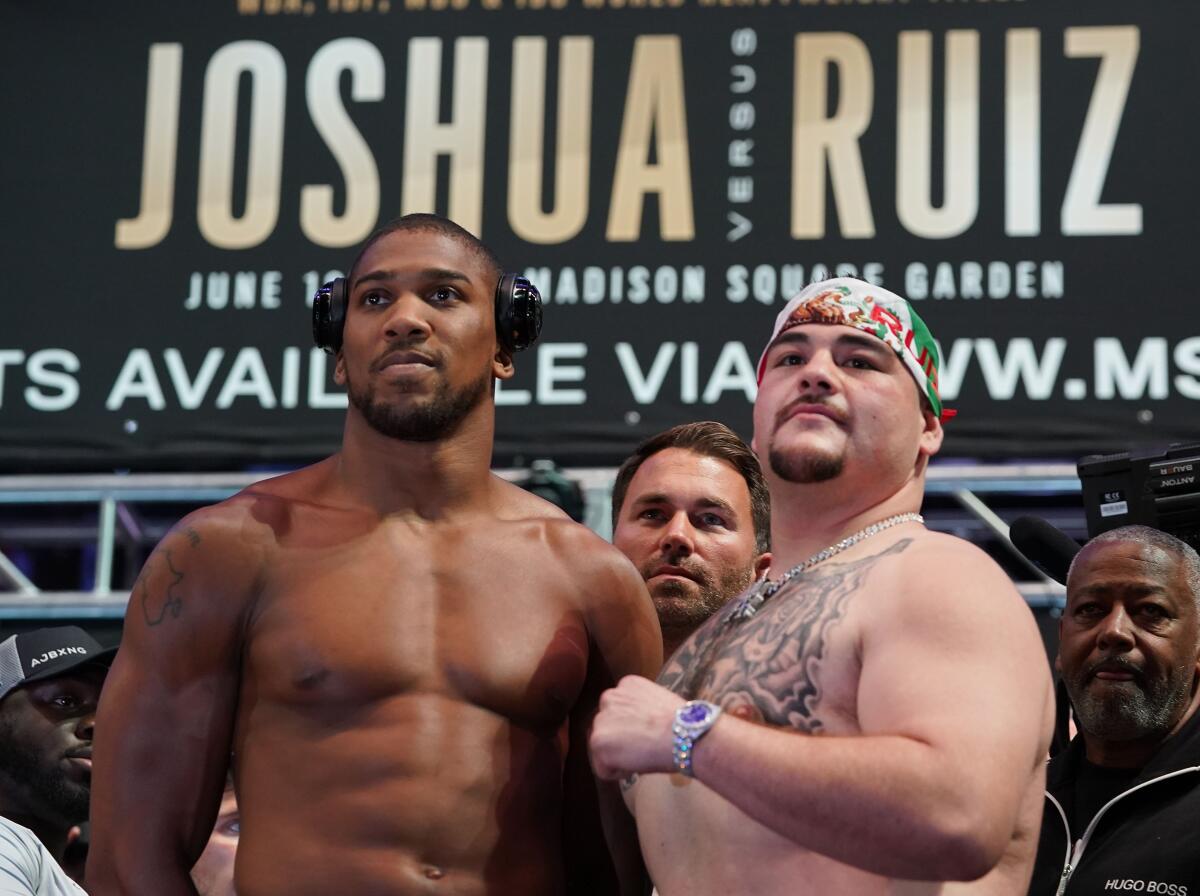 World heavyweight boxing champion Anthony Joshua (L) of England and Mexican-American Andy Ruiz Jr. pose during their weigh-in at Madison Square Garden in New York, May 31, 2019. - Joshua faces challenger Ruiz on June 1, 2019 at Madison Square Garden in New York. (Photo by TIMOTHY A. CLARY / AFP)TIMOTHY A. CLARY/AFP/Getty Images ** OUTS - ELSENT, FPG, CM - OUTS * NM, PH, VA if sourced by CT, LA or MoD **
