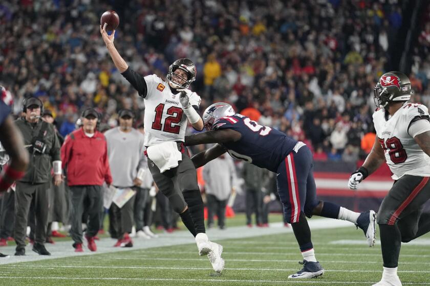 Tampa Bay Buccaneers quarterback Tom Brady (12) throw during the second half.