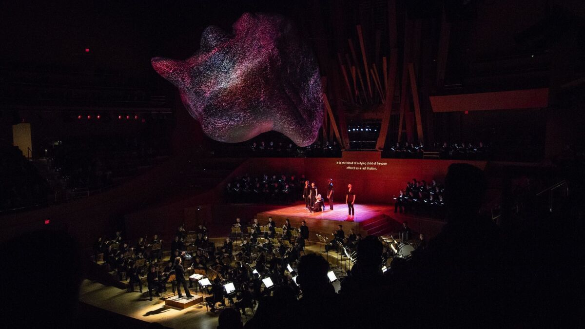 Gustavo Dudamel conducts the Los Angeles Philharmonic in Schumann's 'Das Paradies und die Peri' with soloists and the Los Angeles Master Chorale, and 3-D sculptural projections by Refik Anadol overhead at Walt Disney Concert Hall on Friday.