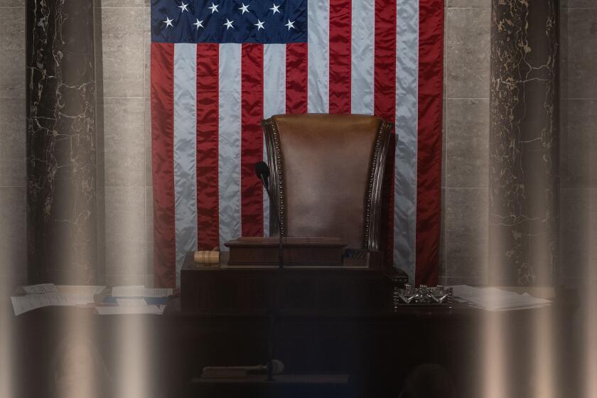 WASHINGTON, DC - JANUARY 03: The empty chair at the top of the three-tiered Dias of the House Chamber of the U.S. Capitol Building on Tuesday, Jan. 3, 2023 in Washington, DC. Today members of the 118th Congress will be sworn in and the House of Representatives will hold votes on a new Speaker of the House. (Kent Nishimura / Los Angeles Times)