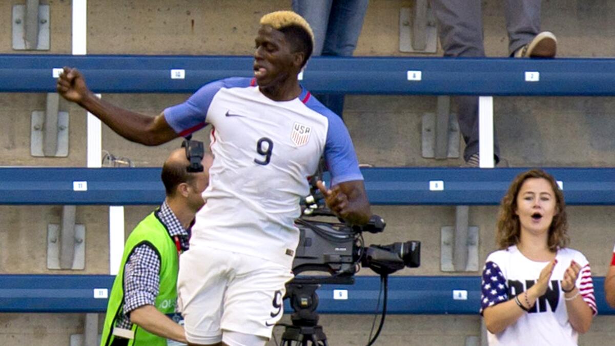 U.S. forward Gyasi Zardes does a celebratory leap after scoring one of his two goals against Bolivia during an exhibition game Saturday.
