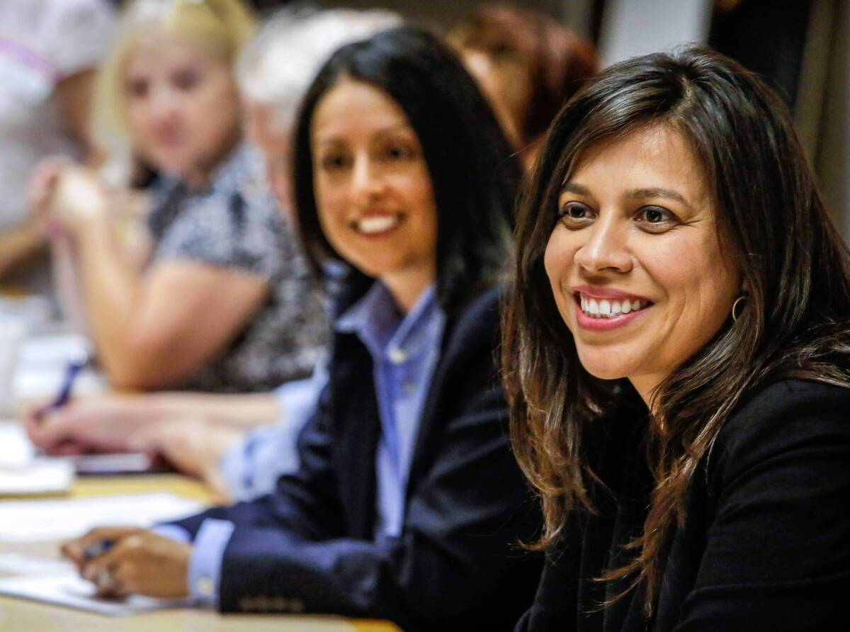 Los Angeles City Council candidate Nury Martinez said she was coming forward with allegations that a man sexually abused her as a child because her rival for the 6th District council seat, Cindy Montanez, last week sent out attack ads accusing Martinez of not doing enough to protect students during a series of teacher abuse scandals that unfolded last year. Above, Montanez, right, and Martinez at a forum last week in Sherman Oaks.