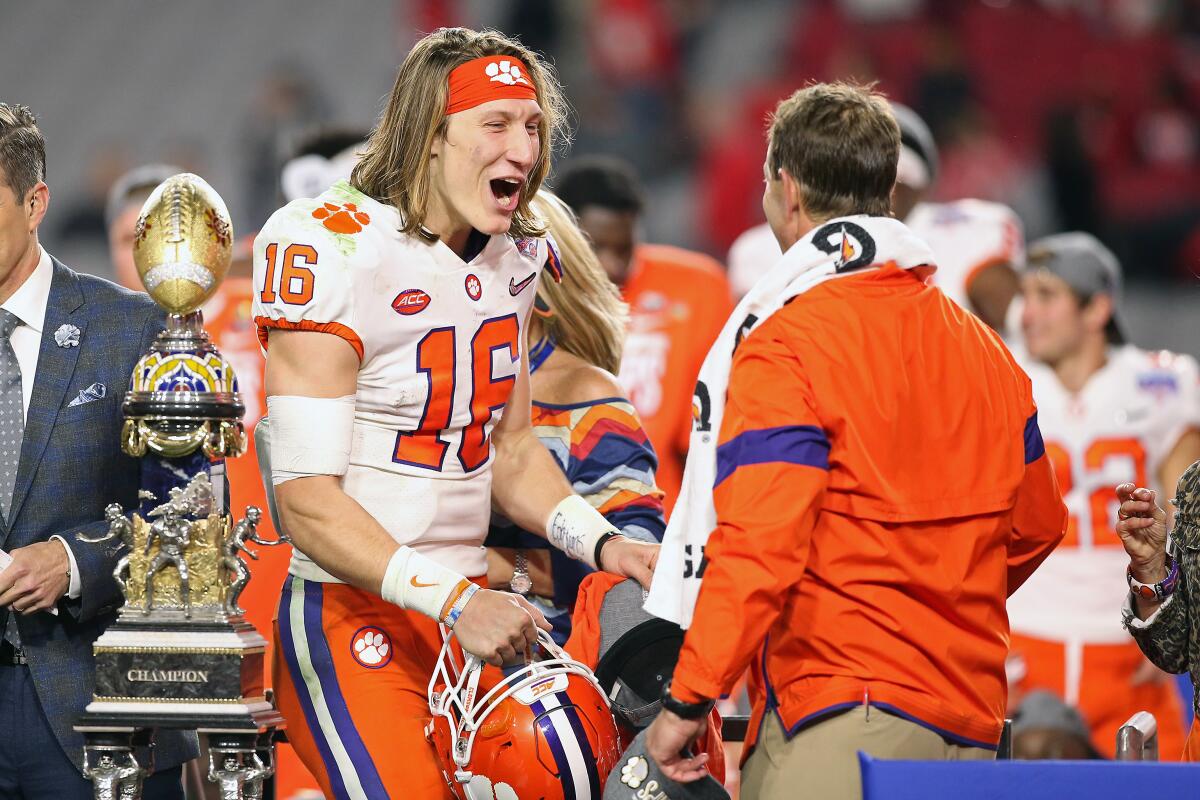 Clemson quarterback Trevor Lawrence celebrates after the Tigers' 29-23 win over Ohio State in their College Football Playoff semifinal Dec. 28 in Glendale, Ariz.