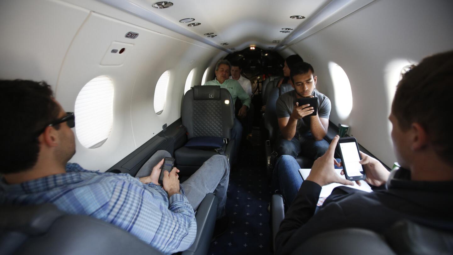 Each seat on Surf Air is both a window and an aisle. Above, passengers fly from Hawthorne to San Carlos.