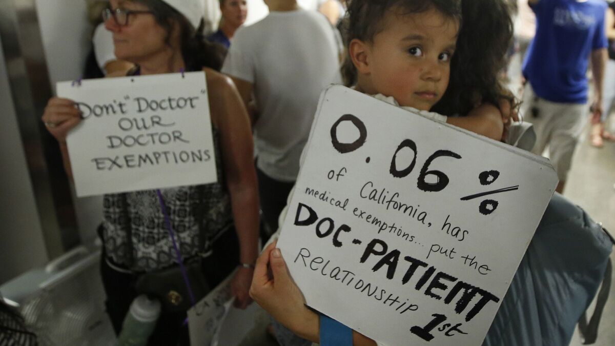 Parents opposed to mandatory vaccination demonstrate in Sacramento.