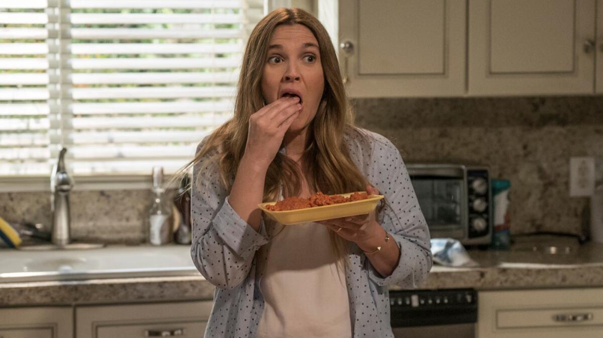 Drew Barrymore is a Southern California housewife turned undead flesh-eater in the Netflix comedy "Santa Clarita Diet." (Saeed Adyani / Netflix)